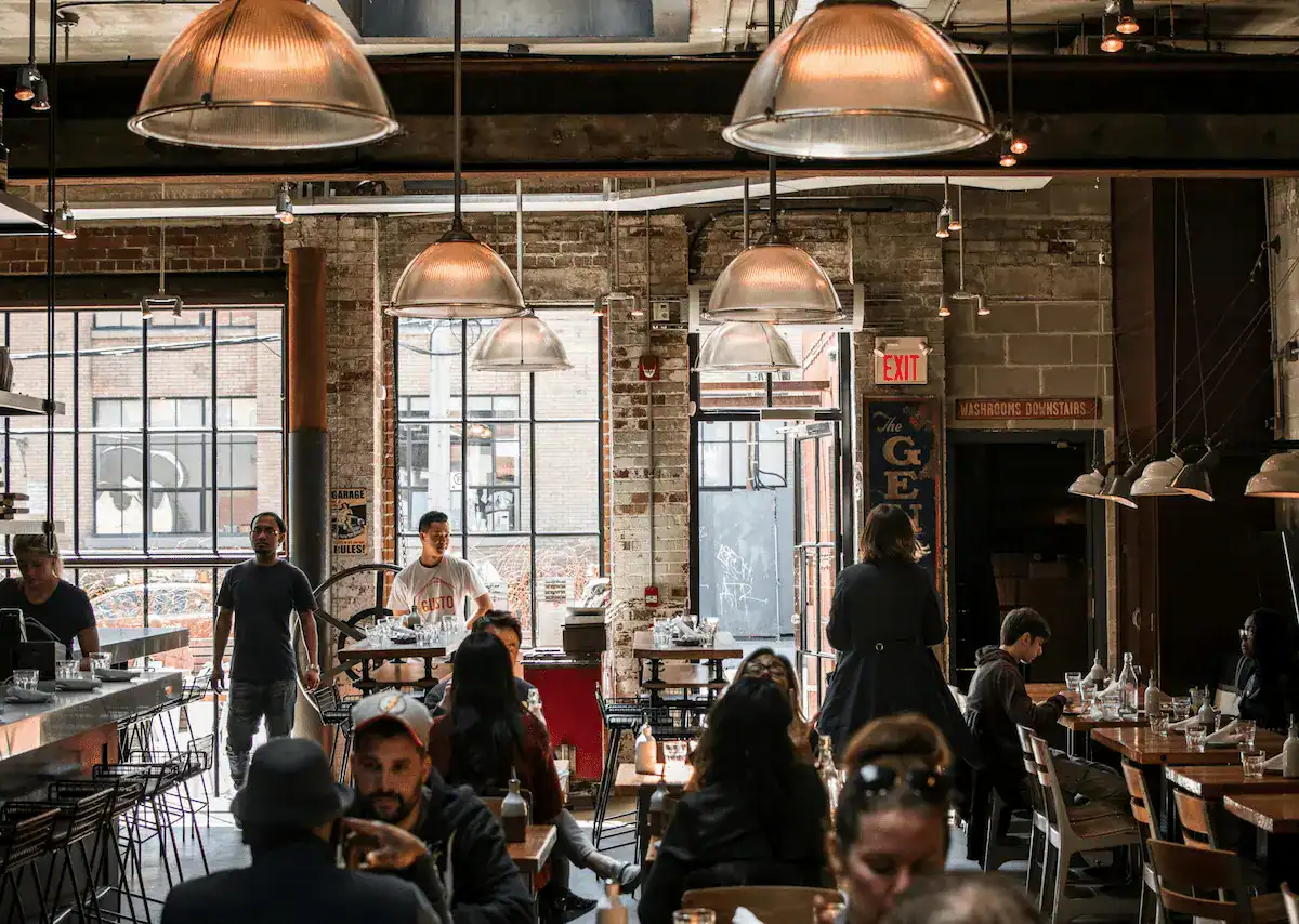 Industrial-style café interior with hanging lights and modern design